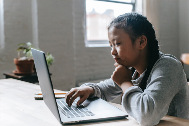 Girl taking her online class